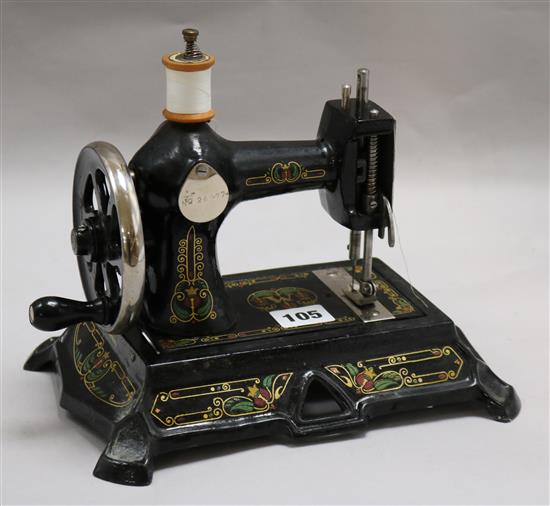 A miniature sewing machine